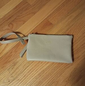Polène Beige Pebbled Clutch Wrist Strap Gold Hardware Zip Closure Solid Pattern